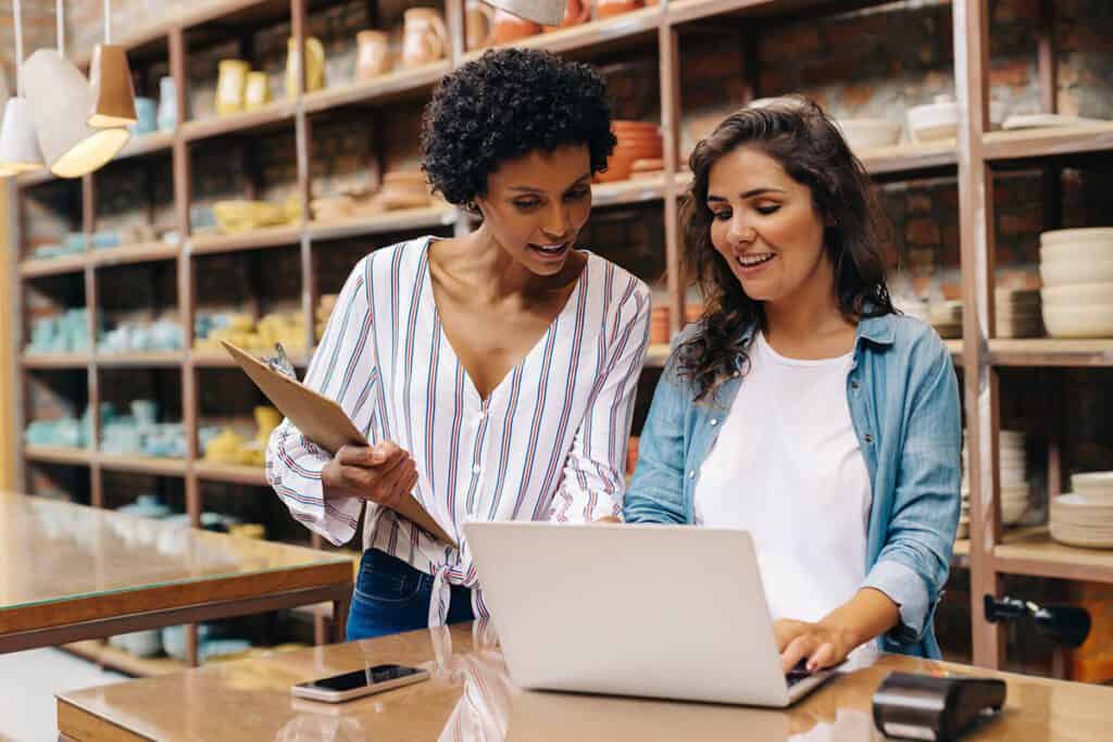 2 women strategizing for a company